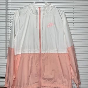 Pink and white Nike windbreaker